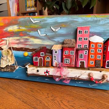 Słońce odpływa, domy czekają